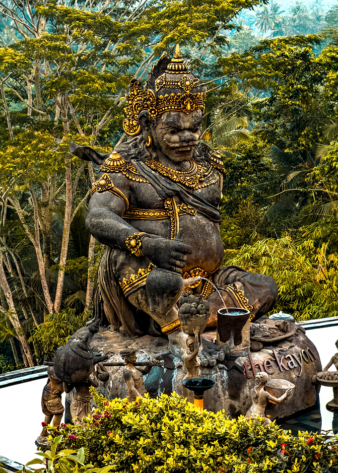 Balinese Statue in Lush Greenery
