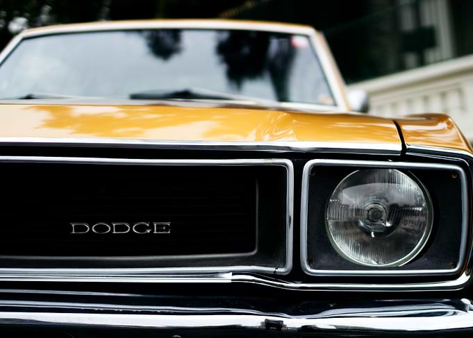 Close-up of a vintage Dodge car grille