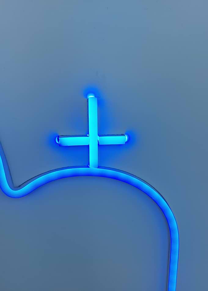 Blue Neon Cross Symbol photo