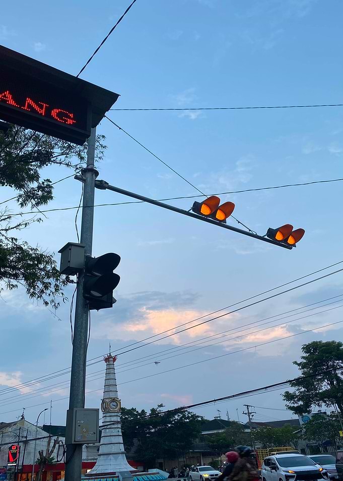 Traffic Lights and Monument at Dusk