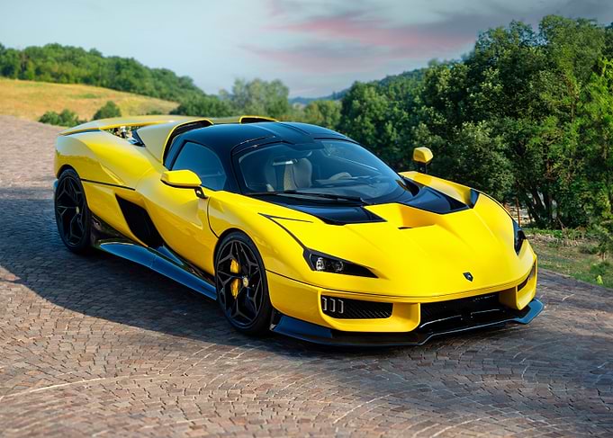 Yellow Supercar on Cobblestone Driveway