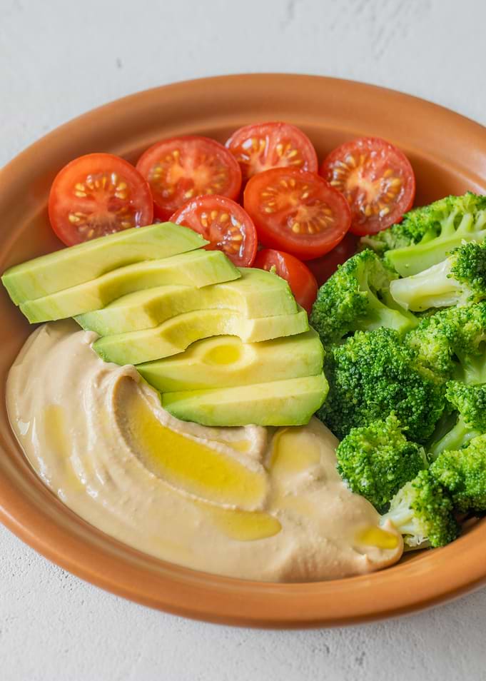 Healthy Hummus Bowl with Avocado and Tomatoes
