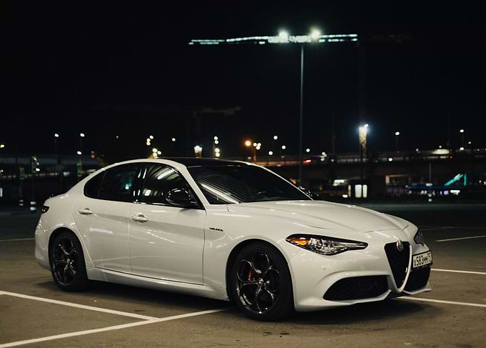 White Alfa Romeo Giulia at Night