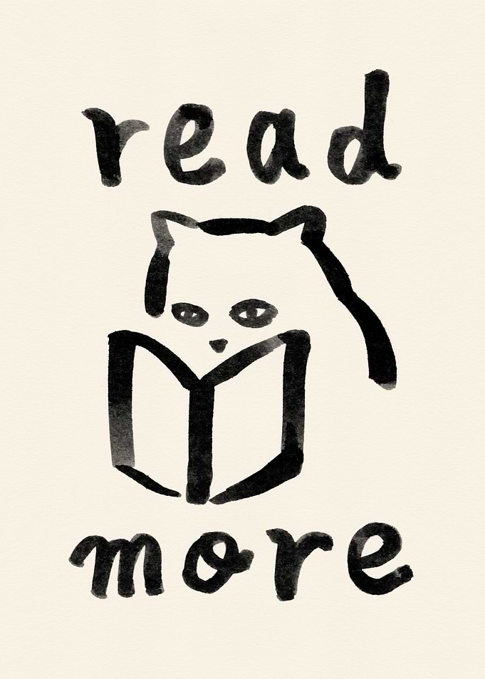 Cat reading a book