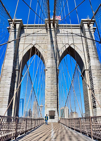 Brooklyn Bridge with a lone walker