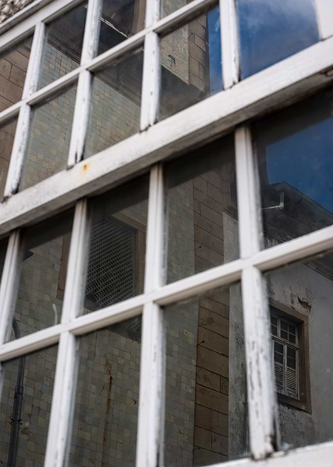 Reflection in Old Window Panes