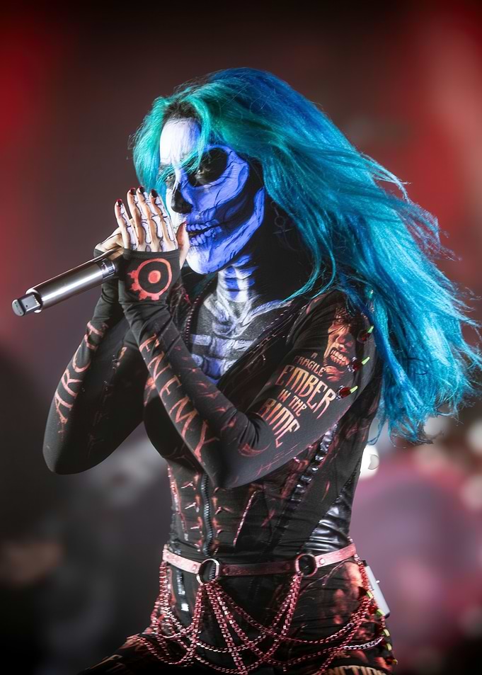 Woman with Skeleton Face Paint Singing