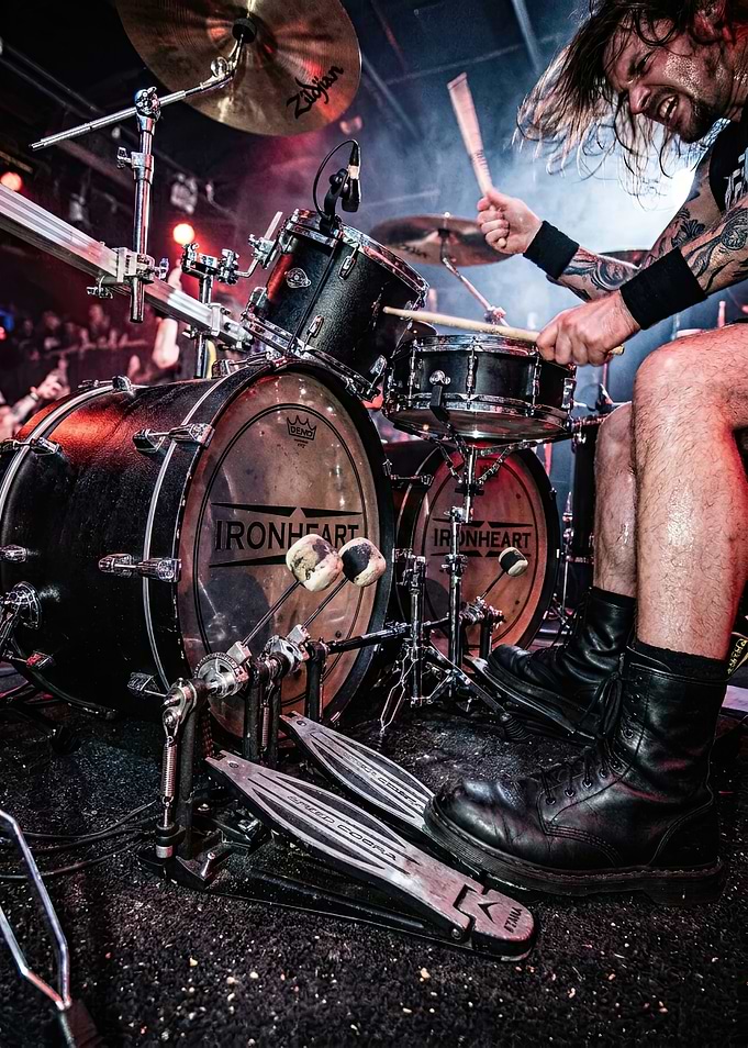 Drummer playing a metal concert