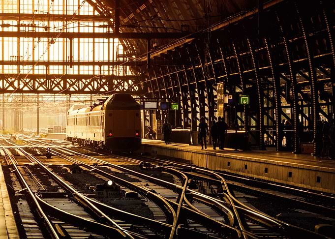 railway station Amsterdam Central at sunset