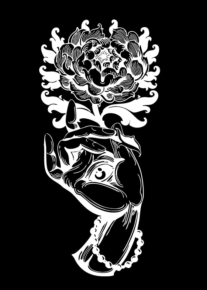 Hand holding a flower with an eye