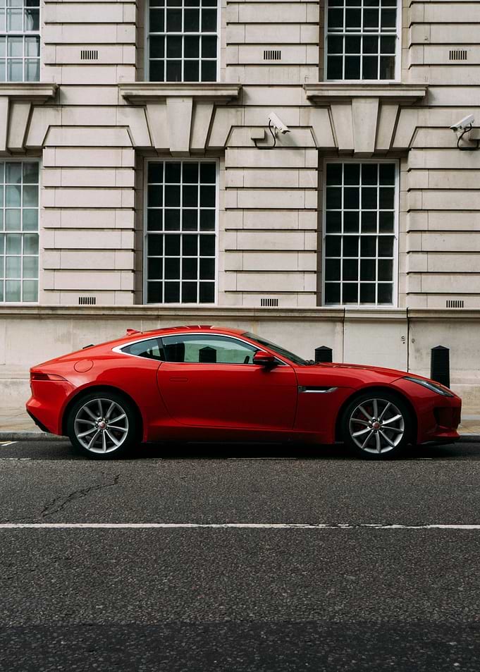 Red Jaguar F-Type Coupe on City Street