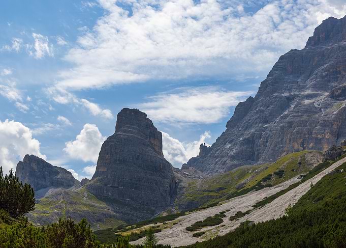 Dramatic Mountain Peaks Under Cloudy Sky - Val Popena - Italy