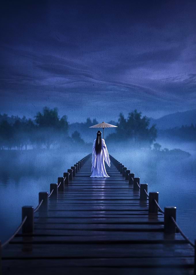 Woman with Umbrella on Pier