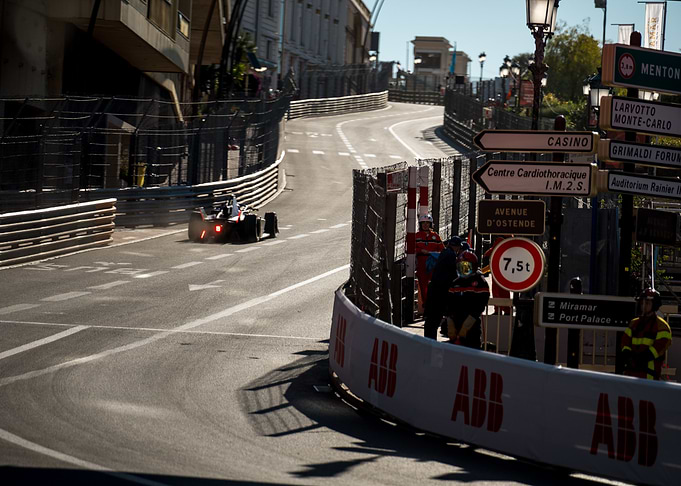 Formula E car racing on Monaco street circuit