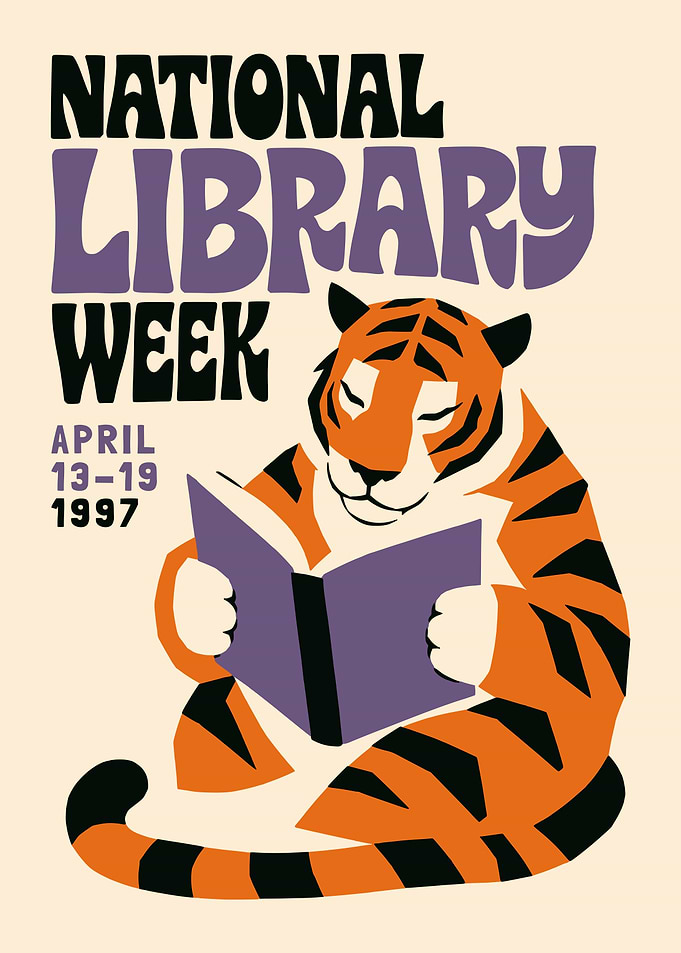 Tiger reading a book for National Library Week