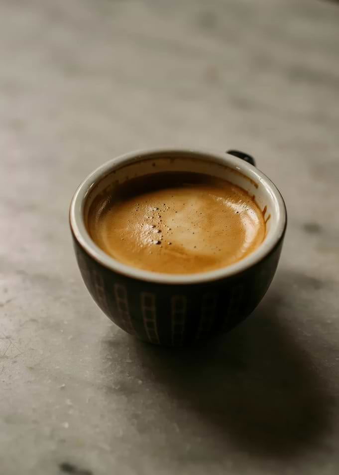 Fresh Espresso in a Patterned Cup