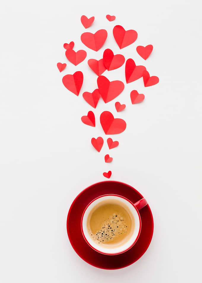 Red Coffee Cup with Paper Hearts