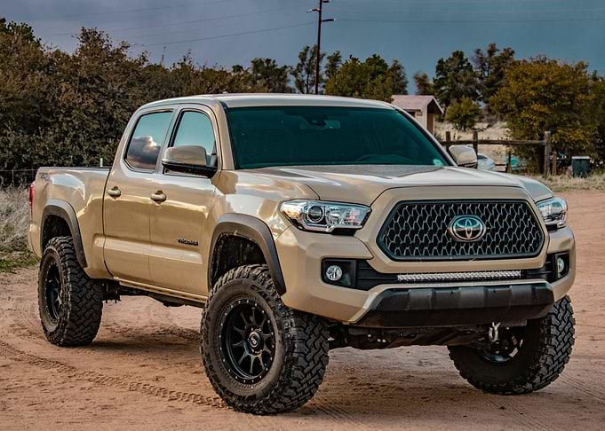 Tan Toyota Tacoma Off-Road Truck