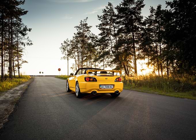 Yellow Honda S2000 on Country Road