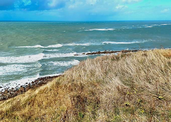 Coastal Cliff Overlooking Windy Sea