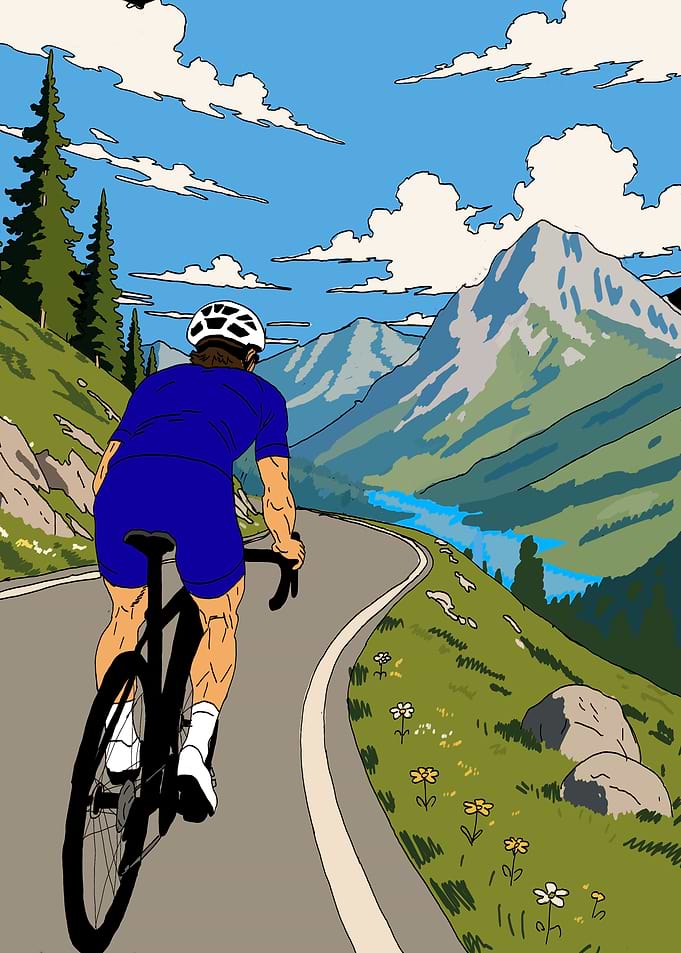 Cyclist Riding Through Mountain Landscape