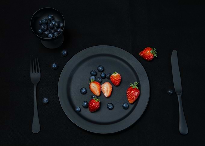 Minimalist Black Plate with Fresh Berries