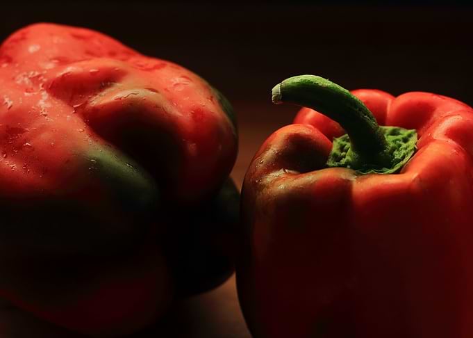 Two Fresh Red Bell Peppers