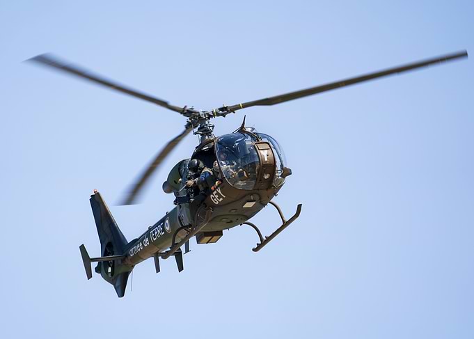 French Army Gazelle Helicopter in Flight with sniper