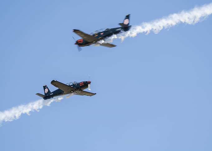 Two T-6 Texan II Aircraft Performing
