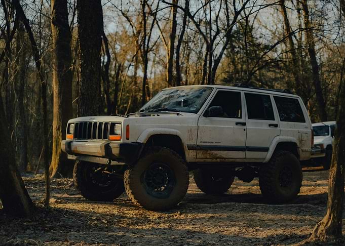White Jeep Cherokee Off-Roading