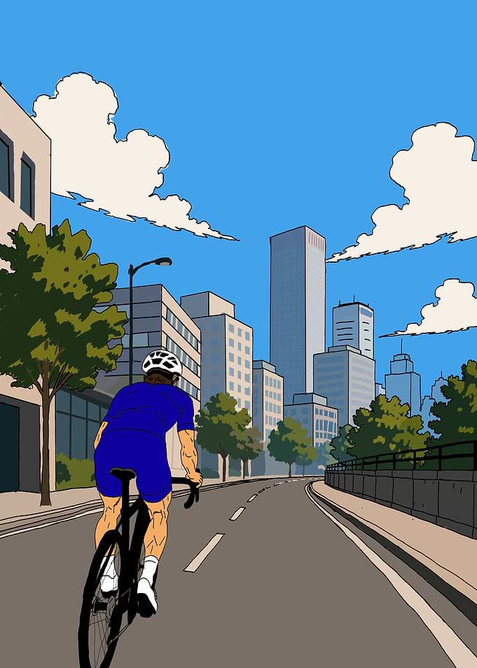 Cyclist Riding Through City Streets