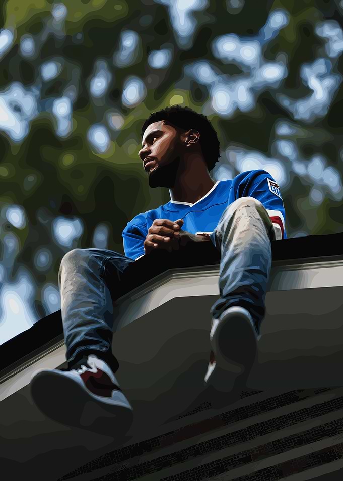 J. Cole Sitting on a Roof