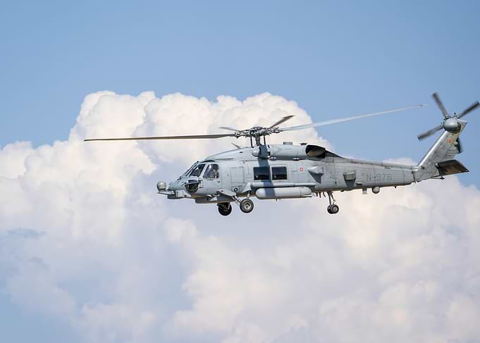 Grey Military Helicopter in Flight MH-60 Seahawk