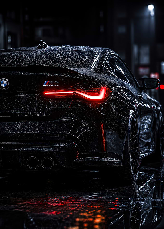 Black BMW M4 Competition at Night