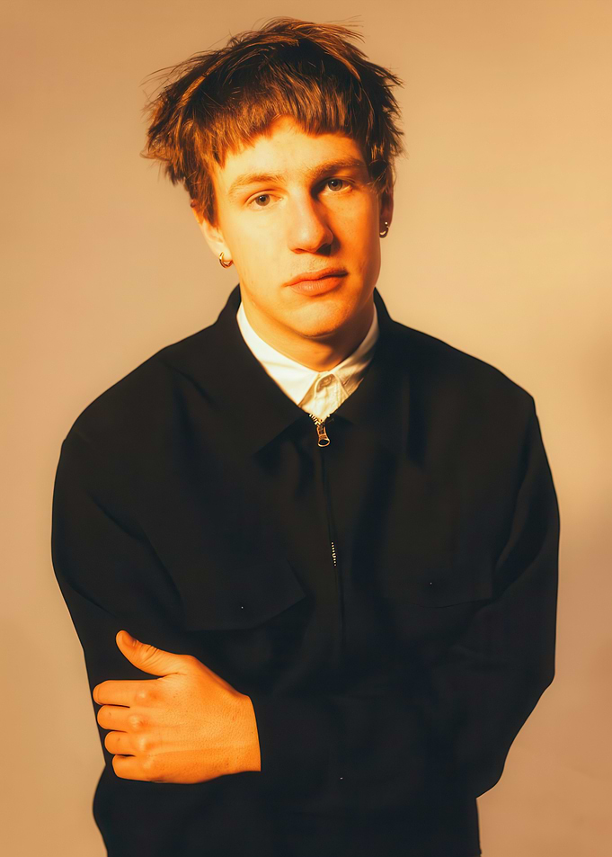 Young man in black zip-up jacket