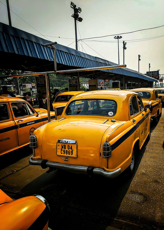 Iconic Yellow Taxi Cabs in Kolkata