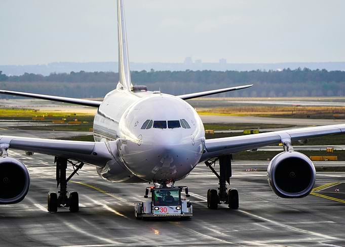 Airplane Being Towed on Tarmac