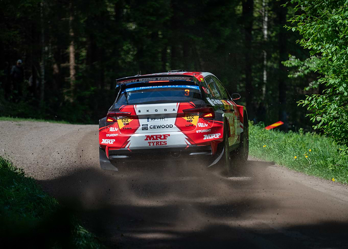 Skoda Rally Car on Dirt Road