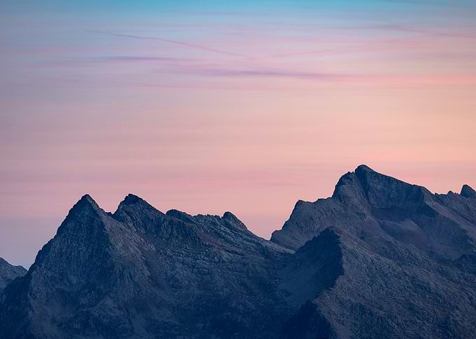 Serene Mountain Peaks at Sunset