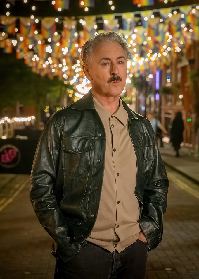 Alan Cumming in Leather Jacket