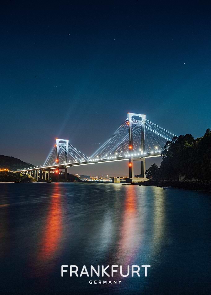 Illuminated Suspension Bridge at Night
