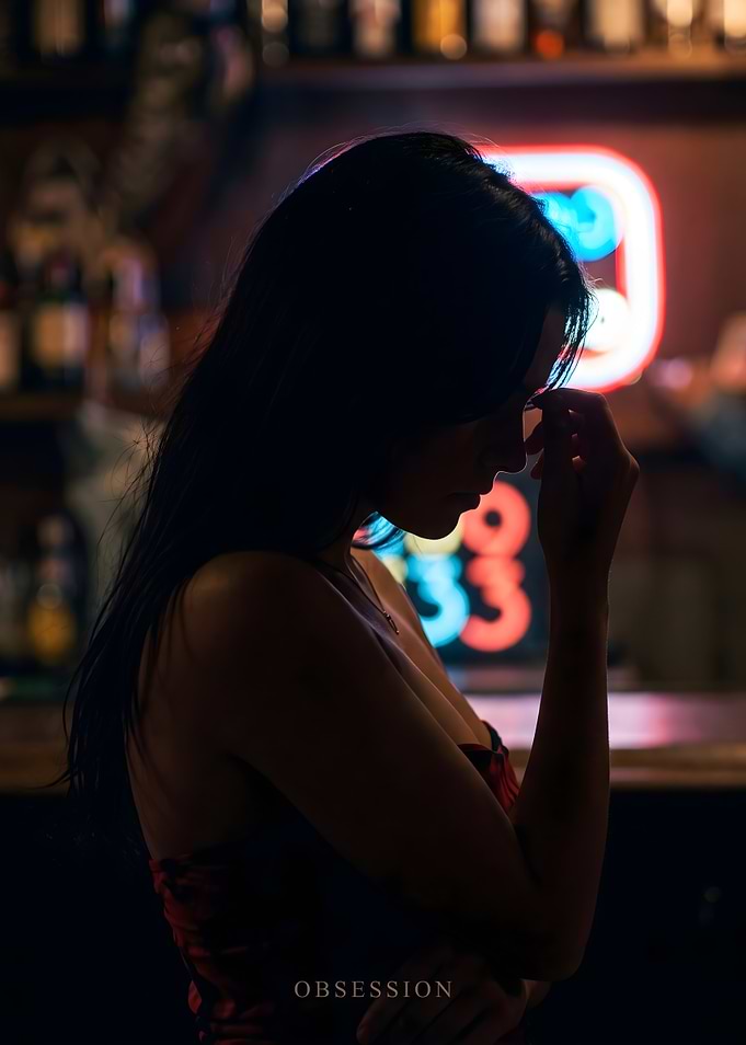 Obsession Silhouette of a Woman in Bar