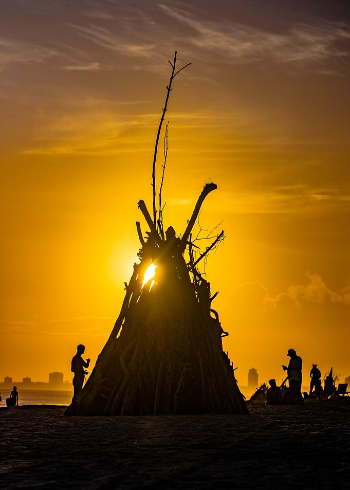 Sunset Silhouette of Beach Bonfire