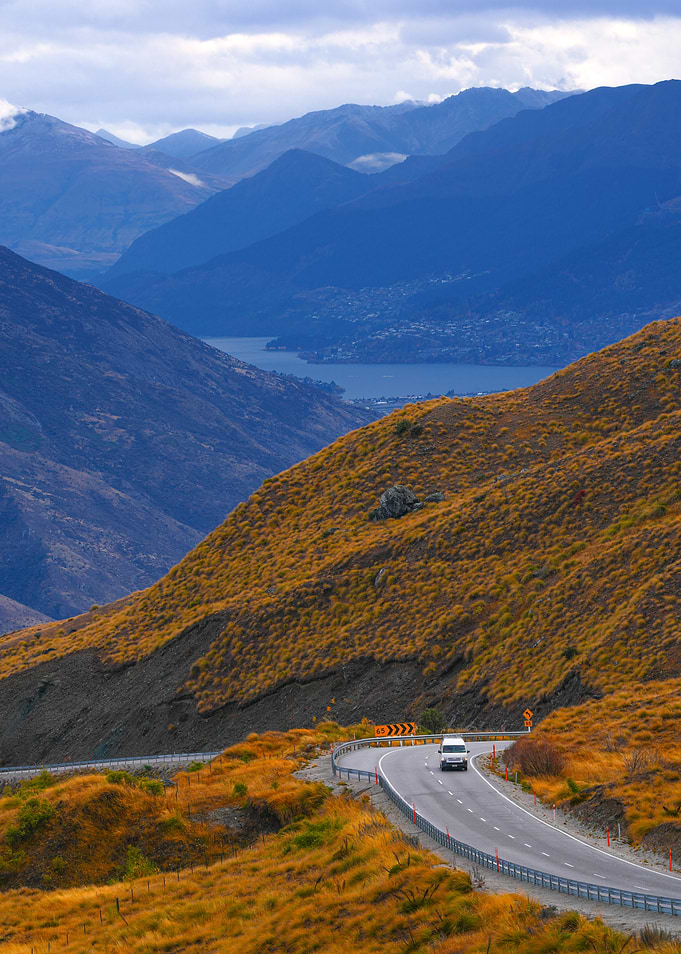 Winding Crown Range Road leading towards Queenstown, New Zealand
