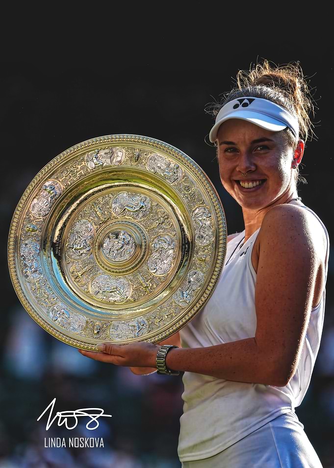 Linda Noskova Holding Tennis Trophy