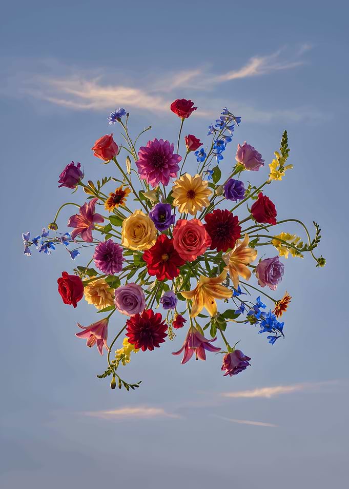Vibrant Floral Bouquet Against Blue Sky