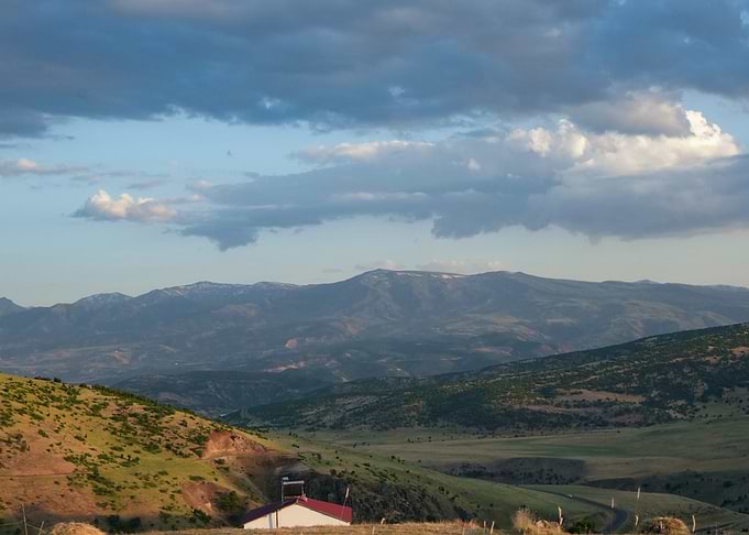Mountainous Landscape at Sunset