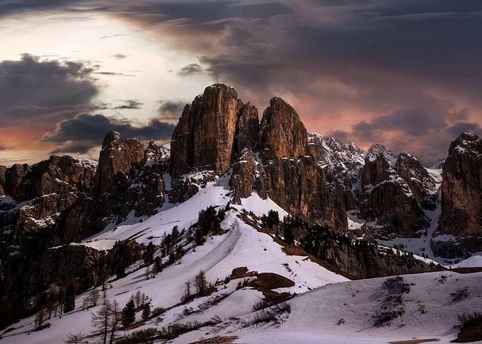 Dramatic Sunset Over Snowy Dolomites
