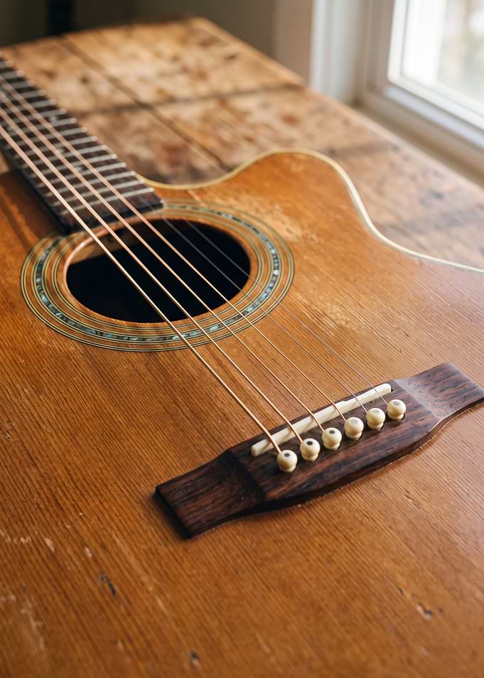 Vintage Acoustic Guitar in Afternoon Sunlight