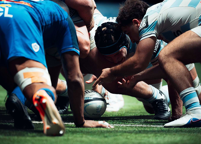 Rugby Players in Intense Scrum